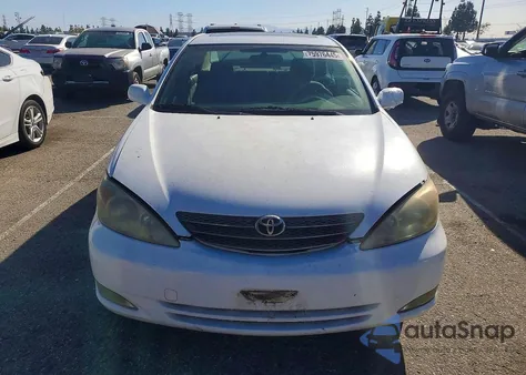 2003 Toyota Camry Le from USA, damaged, VIN JTDBE32K330227066